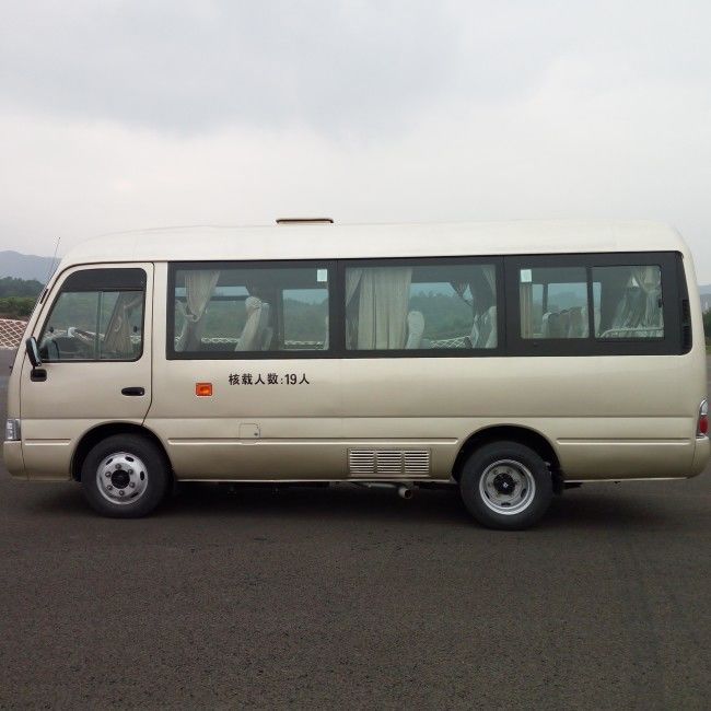 7m 25 places Bus de transport diesel Coaster avec émission Euro 4 et suspension à lames