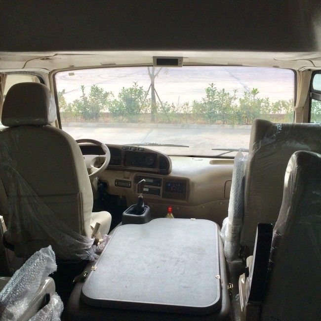 7m 25 places Bus de transport diesel Coaster avec émission Euro 4 et suspension à lames