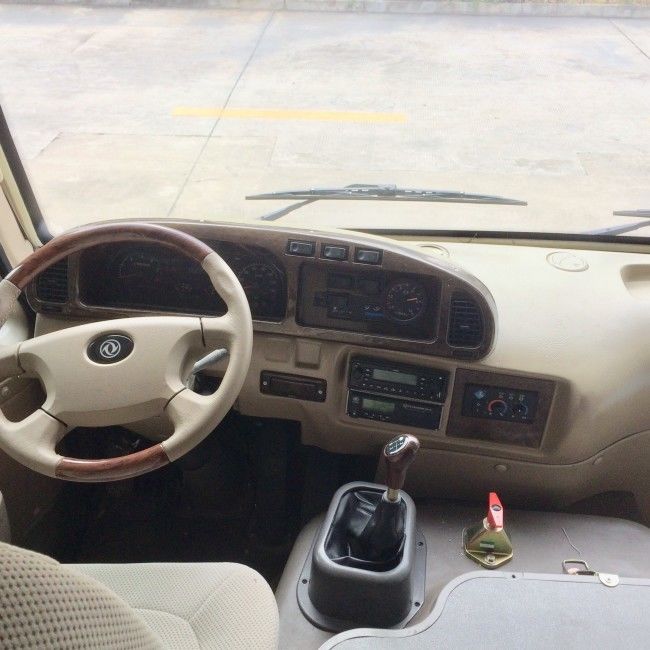 7m 25 places Bus de transport diesel Coaster avec émission Euro 4 et suspension à lames